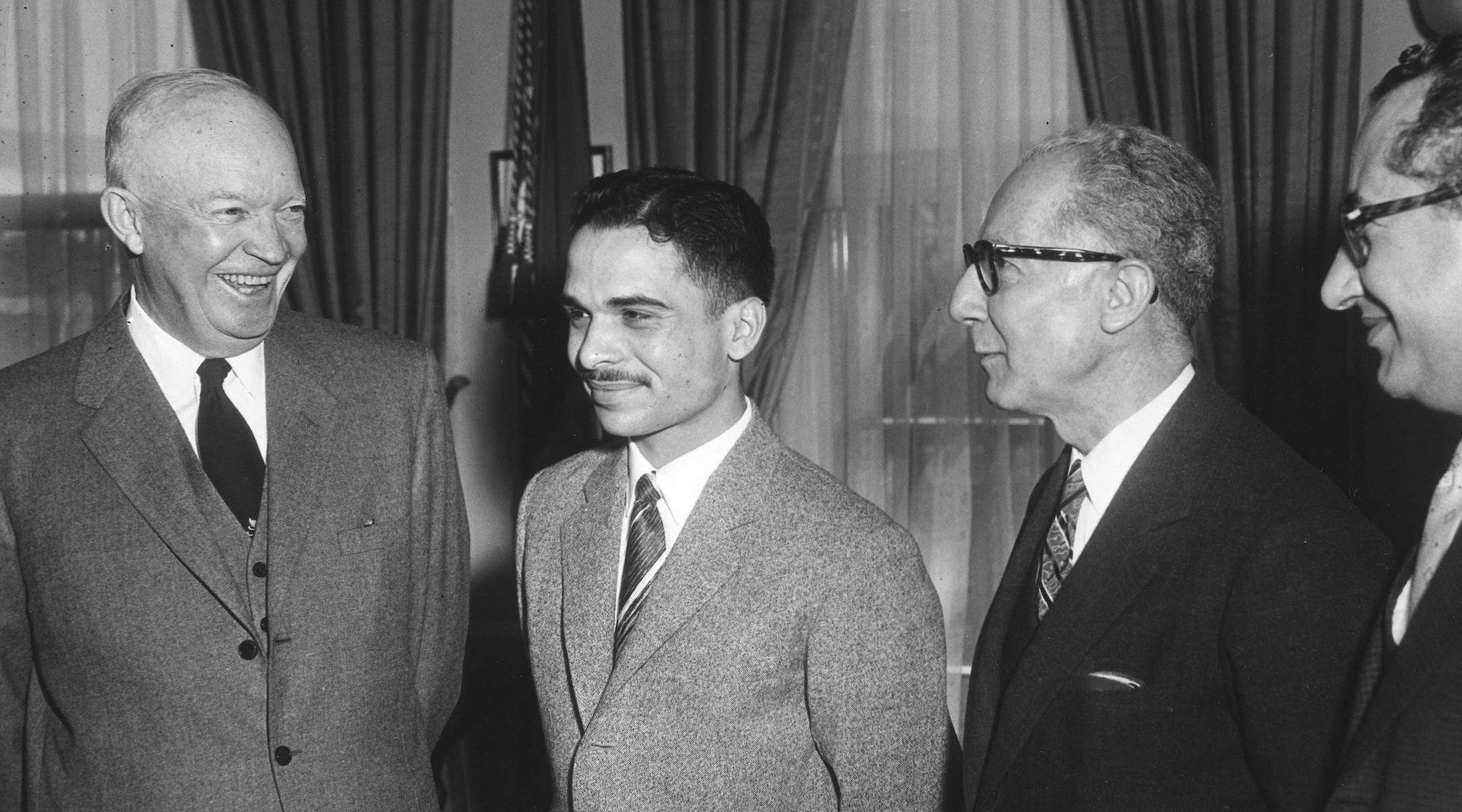 King Hussein of Jordan sharing a laugh with President Dwight Eisenhower in the White House, March 25, 1959. (PhotoQuest/Getty Images)