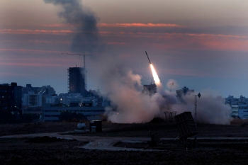 The Iron Dome defense system firing missiles to intercept incoming rockets from Gaza in the port town of Ashdod, Nov. 15, 2012.  (Tsafrir Abayov/Flash90)