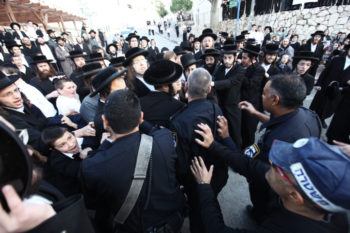Haredi Orthodox men clash with police in the Israeli city of Beit Shemesh, Dec. 26, 2011.  (Kobi Gideon / Flash90)