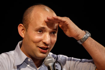 Naftali Bennett, leader of the Jewish Home party, speaking at a high-tech conference in Jerusalem for the haredi Orthodox, Jan. 15, 2013. (Uri Lenz/FLASH90)
