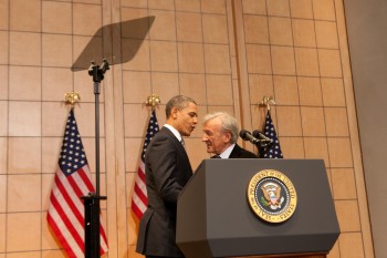President Obama embraces Elie Wiesel before delivering a speech about the Holocaust and its meaning at the U.S. Holocaust Memorial Museum, April 23 2012.  (Courtesy USHMM)