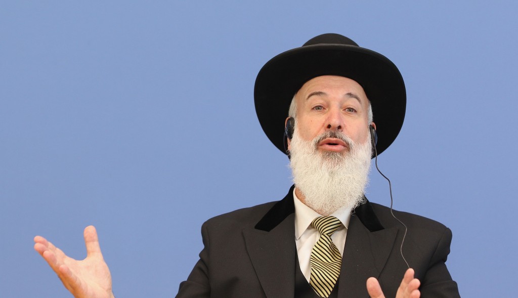 Former Israeli Chief Rabbi Yona Metzger addressing journalists following a 2012 court decision in Cologne, Germany, that the practice violates the bodily integrity of a child. (Sean Gallup/Getty Images)