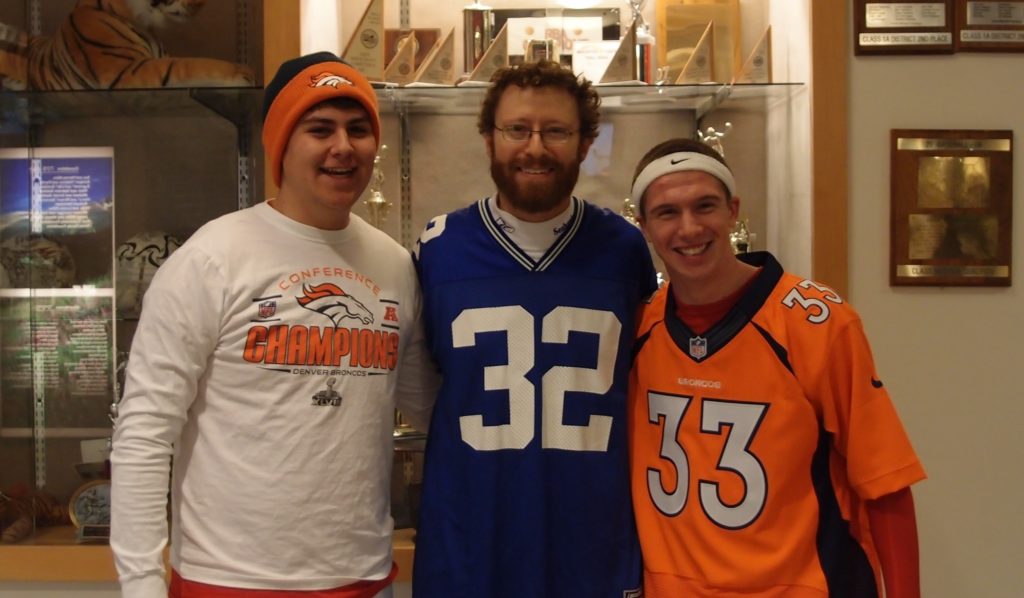 Denver Academy of Torah teacher Benjamin Levy, center, is rooting hard for his hometown Seattle Seahawks, but is mindful of his students' passion for their native Denver Broncos. (Courtesy Benjamin Levy)