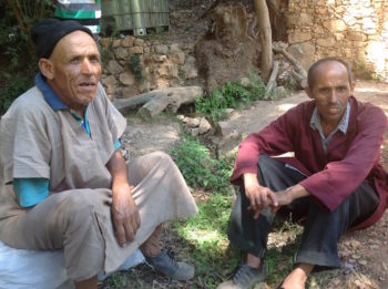 Etrog grower (and retired restaurant worker) Mohammed Douch, left,  with his cousin. (Ben Sales)