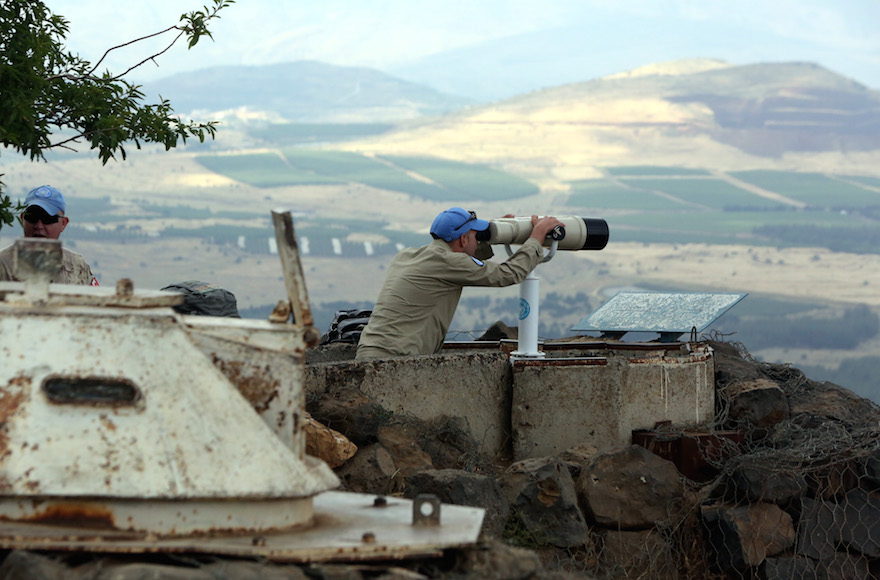 A UN observer atop Mount Bental on the Israeli side of the border with Syria, close to the city of Quneitra, on May 30, 2015. (Yossi Zamir/Flash90)