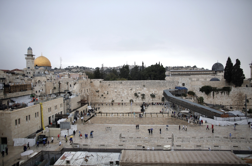 People visiting the Western Wall in the Old City of Jerusalem, Israel, Oct. 25, 2015. (Ahmad Gharabli/AFP/Getty Images)