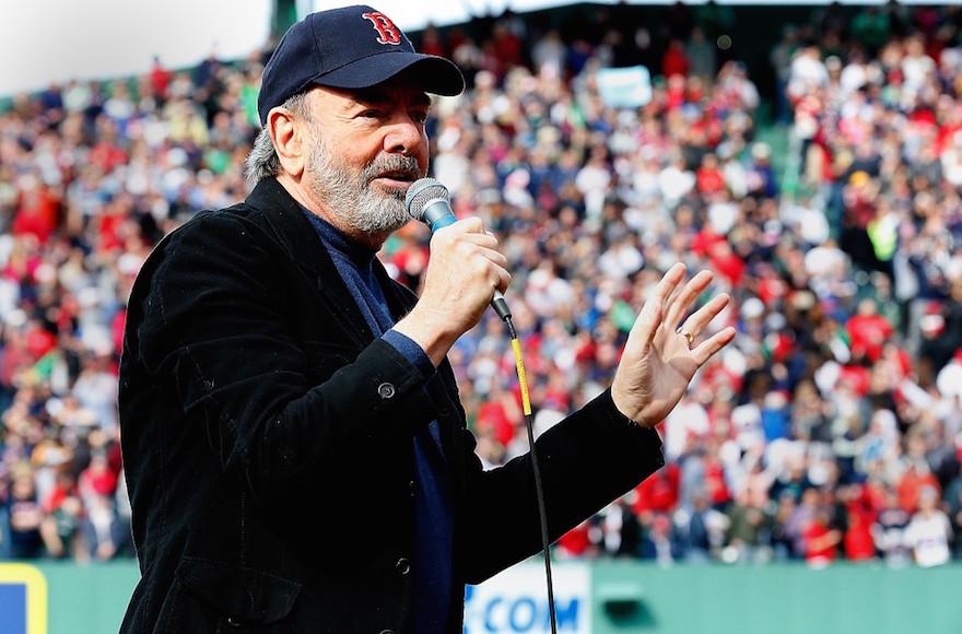 Neil Diamond singing "Sweet Caroline" during a Boston Red Sox  game at Fenway Park, April 20, 2013. (Jim Rogash/Getty Images)