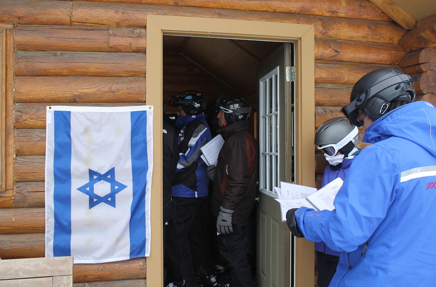 An Israeli flag is posted at Deer Valley's Sunset Cabin every Friday afternoon to alert skiers to the weekly Kabbalat Shabbat service. (Uriel Heilman)