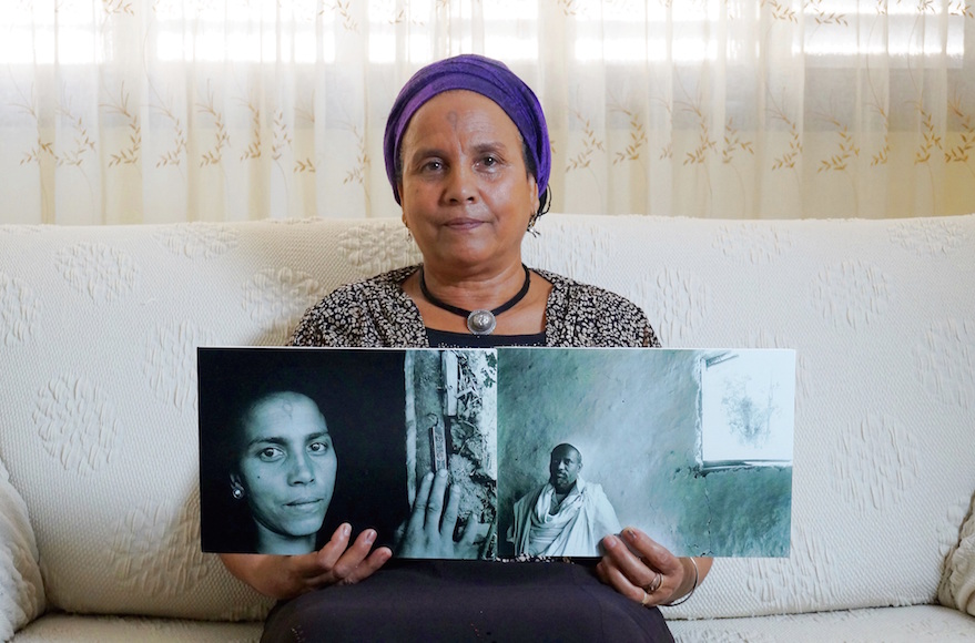 Abeba Brhan with a photo of her late husband Ababa. (Orli Malassa)