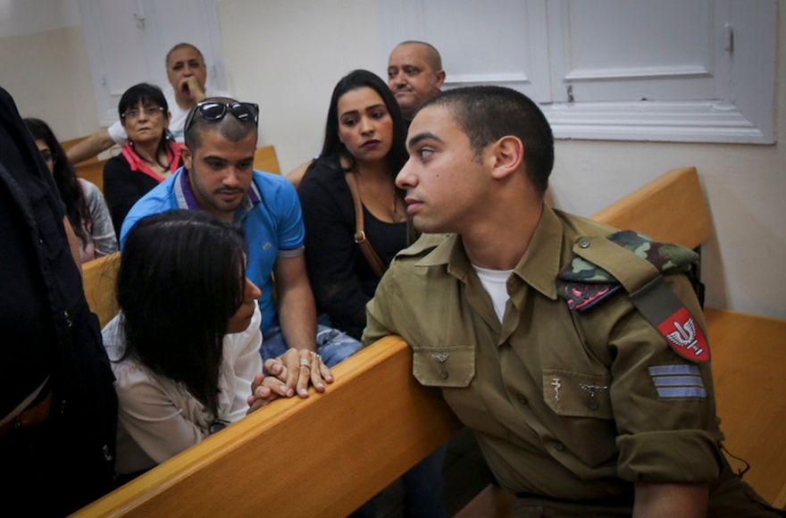 Elior Azaria sitting in Jaffa military court, May 9, 2016. (Flash90)