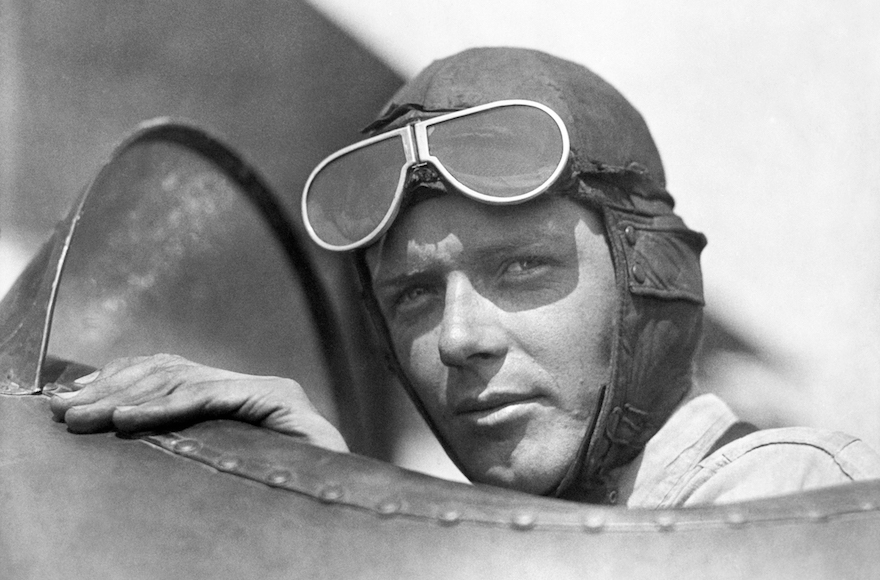Charles Lindbergh, wearing a helmet with goggles up, in the cockpit of an airplane at Lambert Field, St Louis, Missouri, 1923. (Underwood Archives/Getty Images)