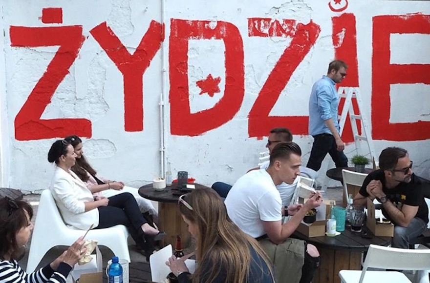 People dining at the Jaffa Israeli restaurant in Lodz, Poland, June 11, 2016. (Courtesy of Rafal Betlejewski)