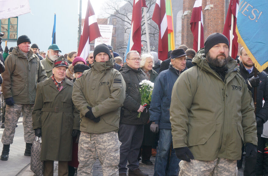 SS veterans and their supporters march in Riga, Latvia on March 16, 2018. (Cnaan Liphshiz)