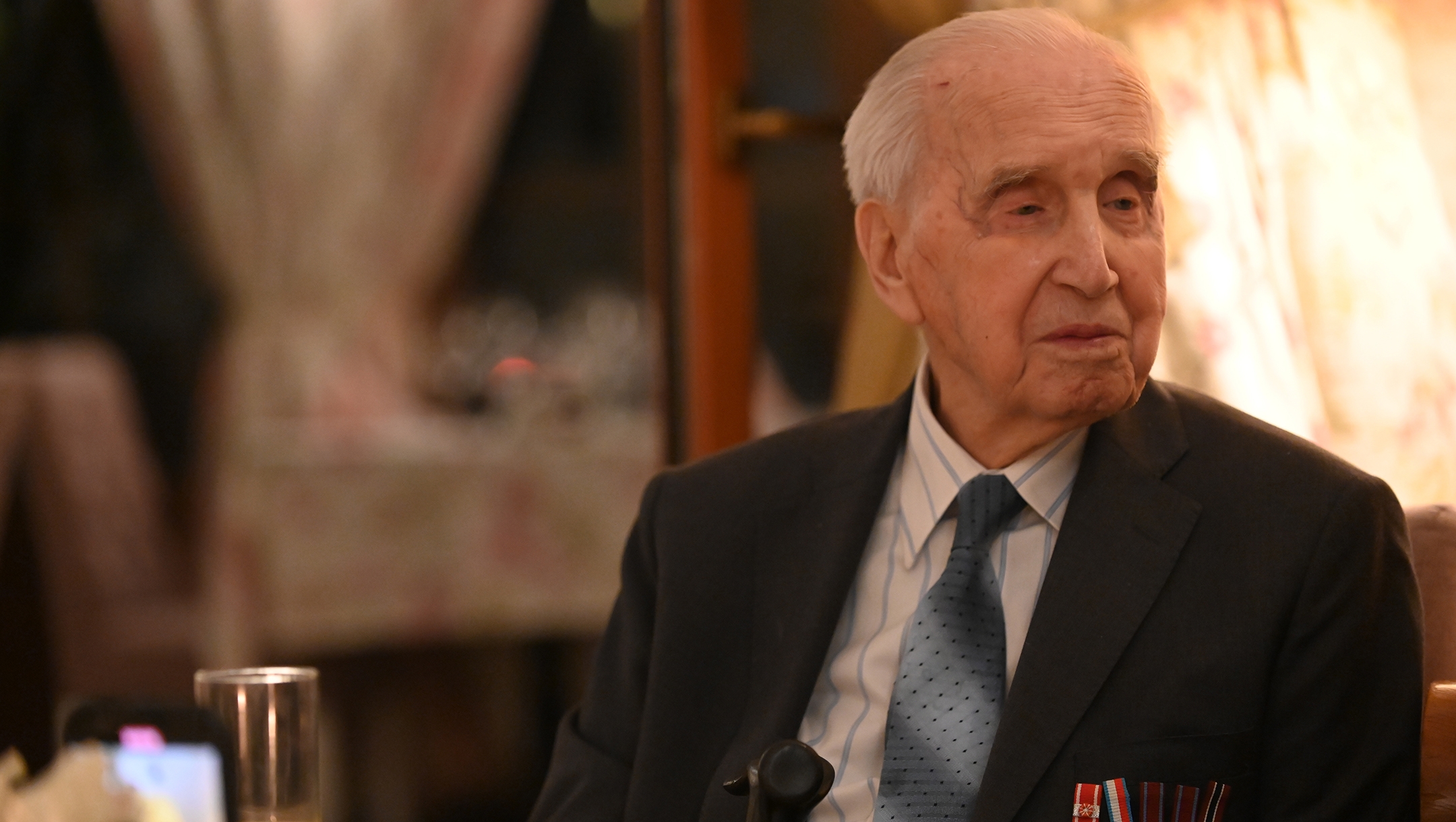 Jozef Walaszczyk, 100, who saved more than 50 Jews during the Holocaust, telling his story at a restaurant in Warsaw, Poland on Jan. 28, 2020. (Cnaan Liphshiz)