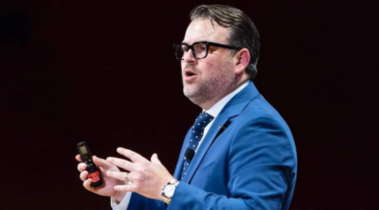 Evan Bernstein, shown here speaking to students at Harvard University, is the new CEO of the Community Security Service, which trains congregants in how to protect their synagogues. (Courtesy of Harvard University)