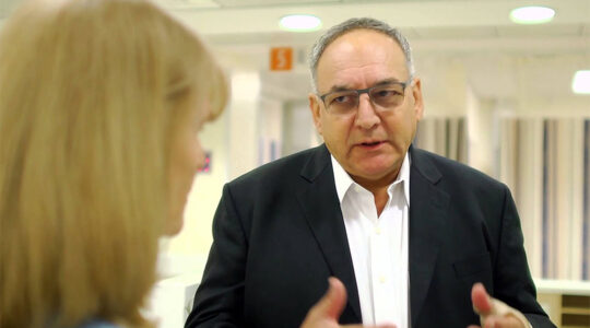 Dr. Zeev Rotstein speaks to journalist Ellen Hershkinin at Hadassah Hospital in Jerusalem, Israel in 2016. (Hadassah International/YouTube)