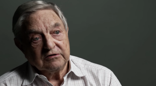 A new documentary about George Soros, pictured above giving an interview in the film's trailer, has been called a 'hagiography.' (Screenshot)