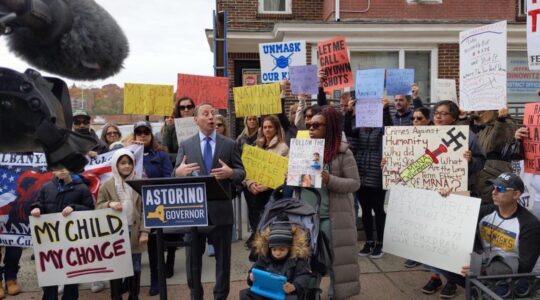 Anti-vaccine protest with Nazi symbol