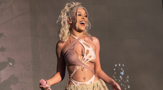 Doja Cat performing onstage