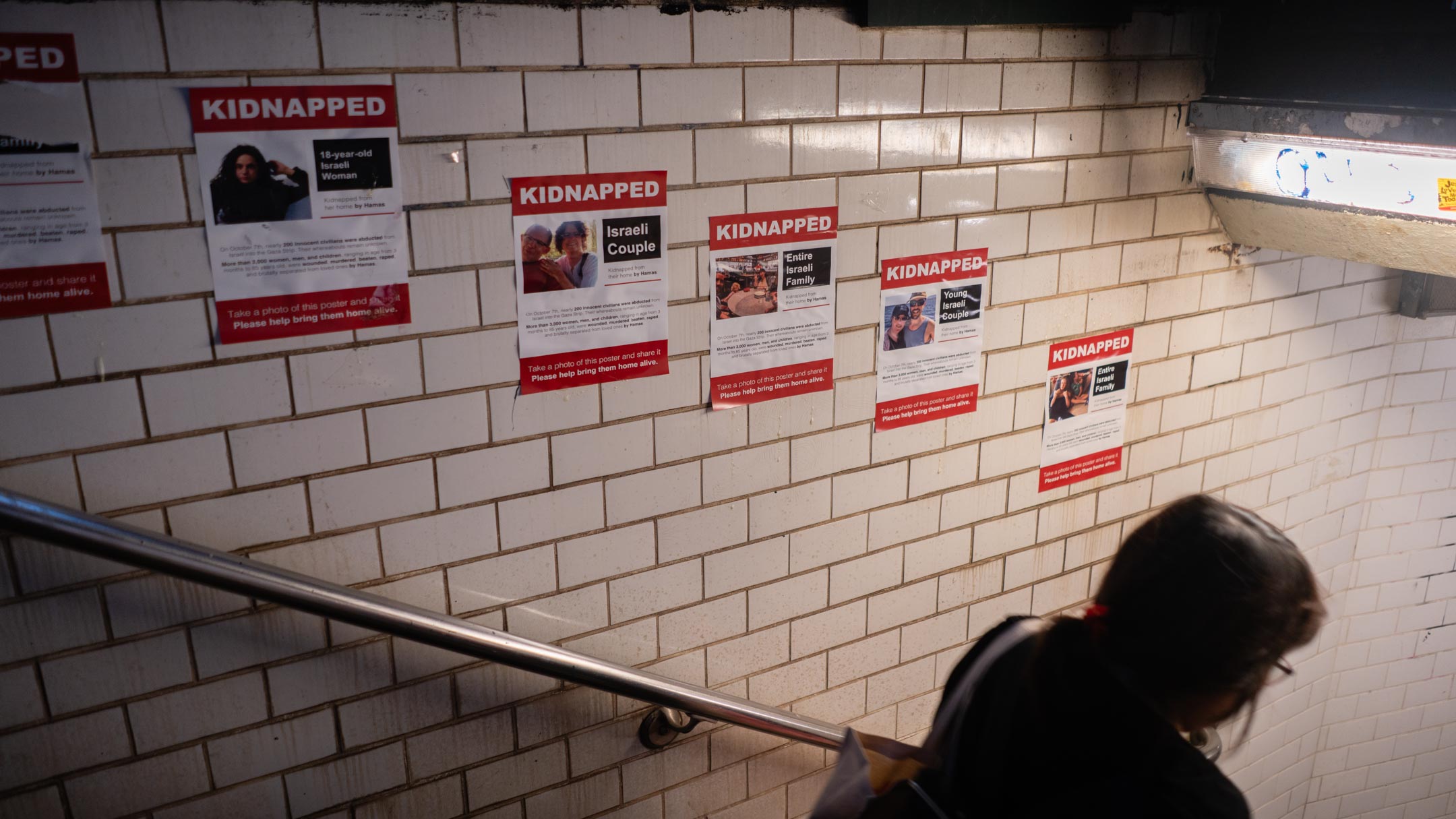 Posters of Israeli hostages in New York City's Union Square subway station, October 16, 2023. (Luke Tress)