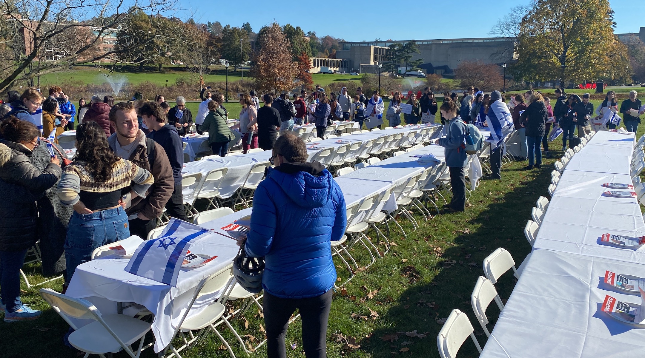 Empty Shabbat tables at a vigil for Israeli hostages