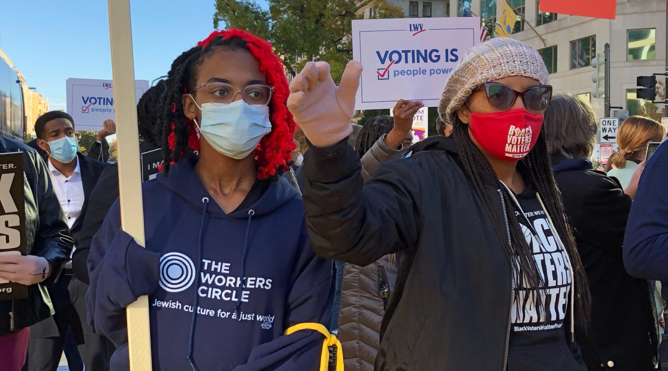 Activists from the Workers Circle and Black Voters Matter on their way to a protest outside the White House in 2021. (Workers Circle)