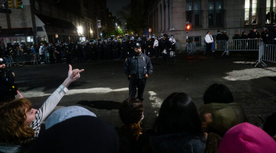 Protesters and police outside Columbia University, April 30, 2024. (Luke Tress)