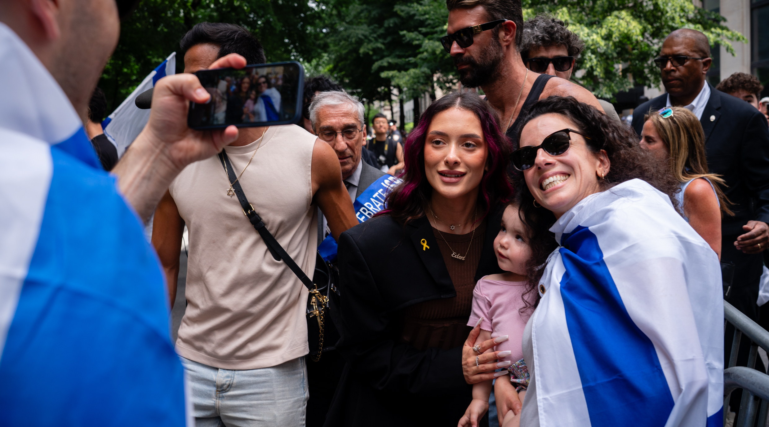 Israeli pop star Eden Golan poses with fans at the annual Israel parade in New York City, June 2, 2024. (Luke Tress)