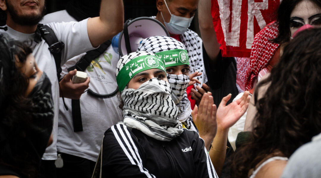 Protesters wearing Hamas headbands and masks at Baruch College in Manhattan, June 5, 2024. (Luke Tress)