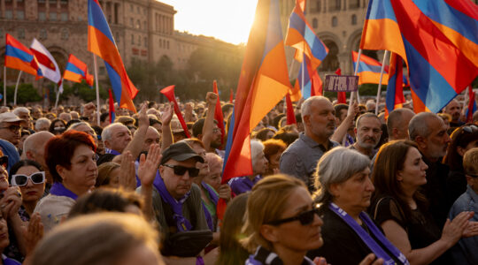 Thousands of Armenian protesters gather for Archbishop Bagrat Galstanyan's speech during a rally against the government, in Yerevan Republic Square on June 9, 2024. (Anthony Pizzoferrato / Middle East Images / Middle East Images via AFP)