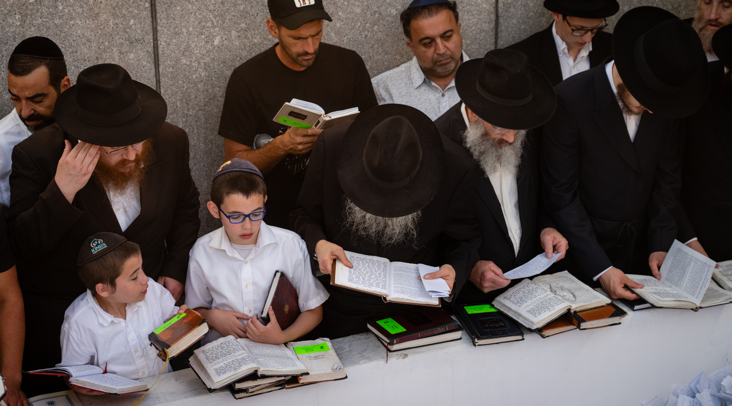 Worshipers at the resting place of Rabbi Menachem Mendel Schneerson, the Lubavitcher rebbe, on the 30th anniversary of his passing, in Queens, July 8, 2024. (Luke Tress)