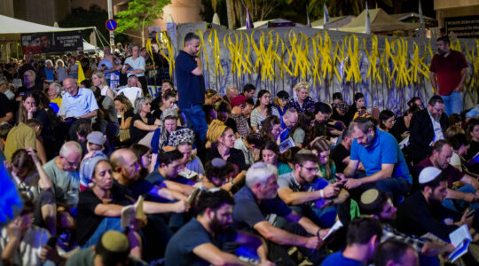 Families of Israelis held hostage in the Gaza Strip and Israelis gather for the ritual of Tisha B'Av at Hostage Square in Tel Aviv, August 12, 2024. (Avshalom Sassoni/Flash90)