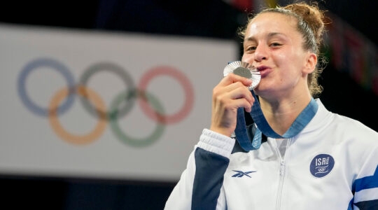 Silver medalist Inbar Lanir of Team Israel celebrates after the Women's Judo 78-kilogram medal ceremony. (Alex Gottschalk/DeFodi Images via Getty Images)