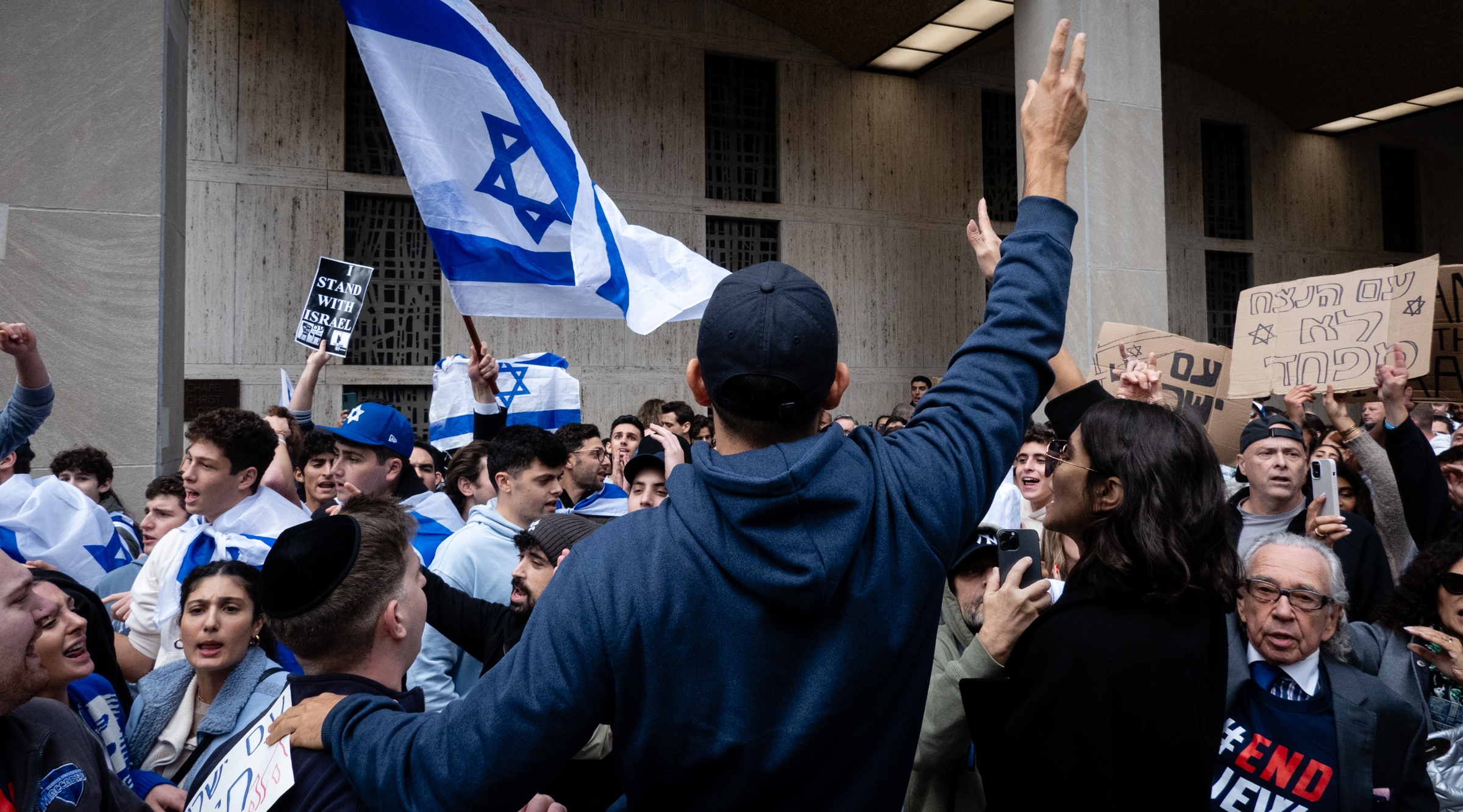 At the same time, hundreds of Jews and Israelis gathered in midtown Manhattan to mourn and rally in support of Israel. The two groups later met, with the pro-Palestinian side mocking and taunting the pro-Israel side. (Luke Tress)