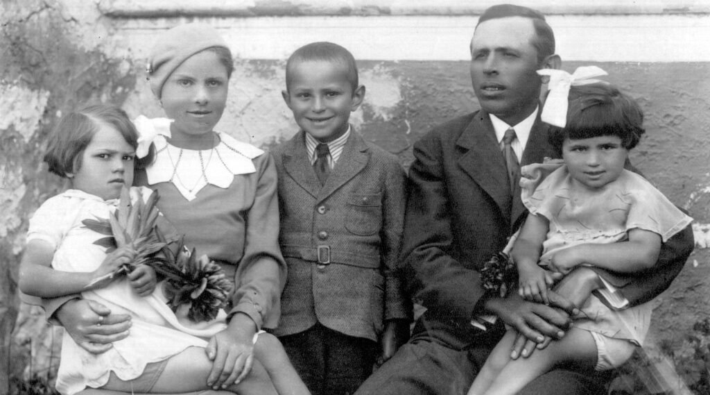 Childhood photo of Martin Greenfield and his family.