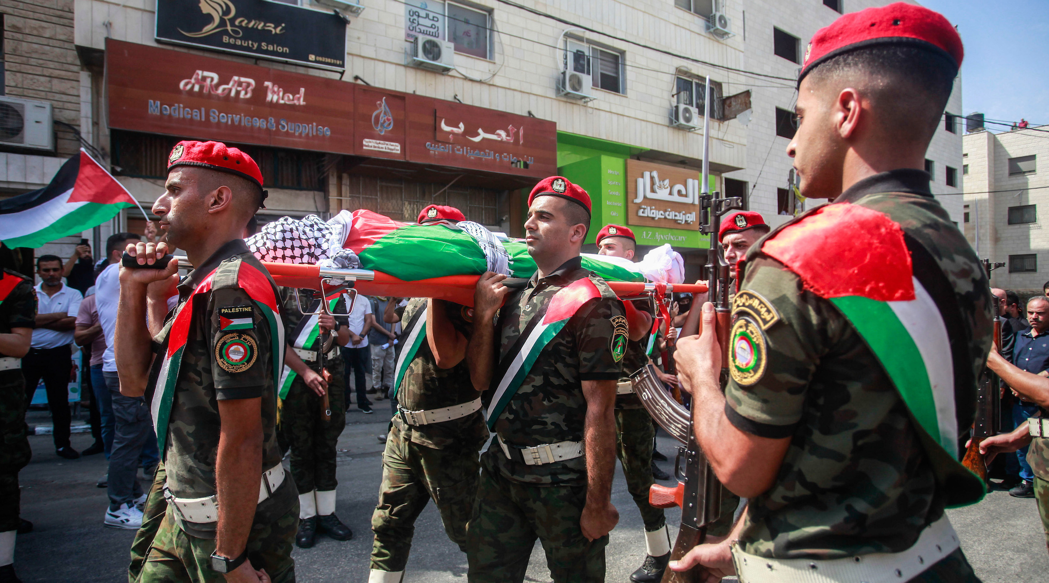 Members of Palestinian security forces carry the body of Turkish-American International Solidarity Movement activist Aysenur Ezgi Eygi during a funeral procession in Nablus in the West Bank. (Nasser Ishtayeh/SOPA Images/LightRocket via Getty Images)