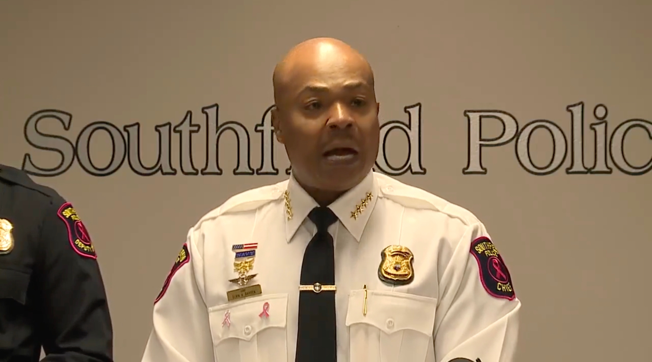 A police officer at a press conference