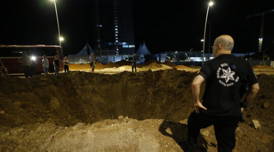 A view of a giant holes after missiles are fired from Iran towards Israel, falling in Herzliya.