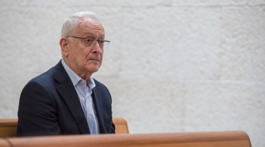 A newspaper publisher in an Israeli courtroom