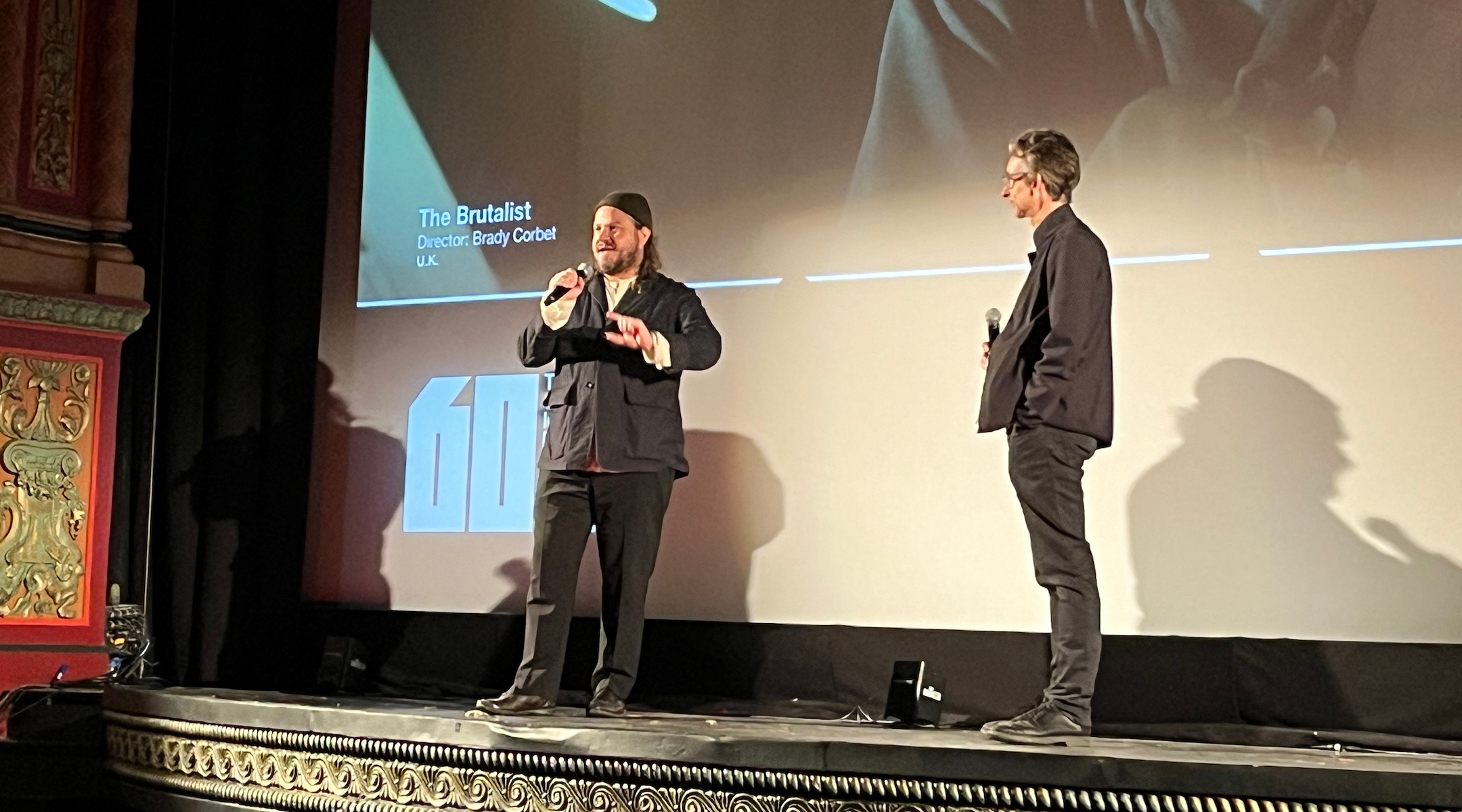 A filmmaker introduces his movie at a movie theater