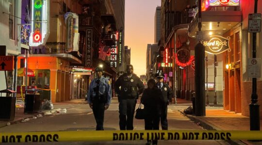 Police cordon off the area around the site of the overnight attack in the French Quarter of New Orleans on Jan. 1, 2025. (Matthew HINTON / AFP)