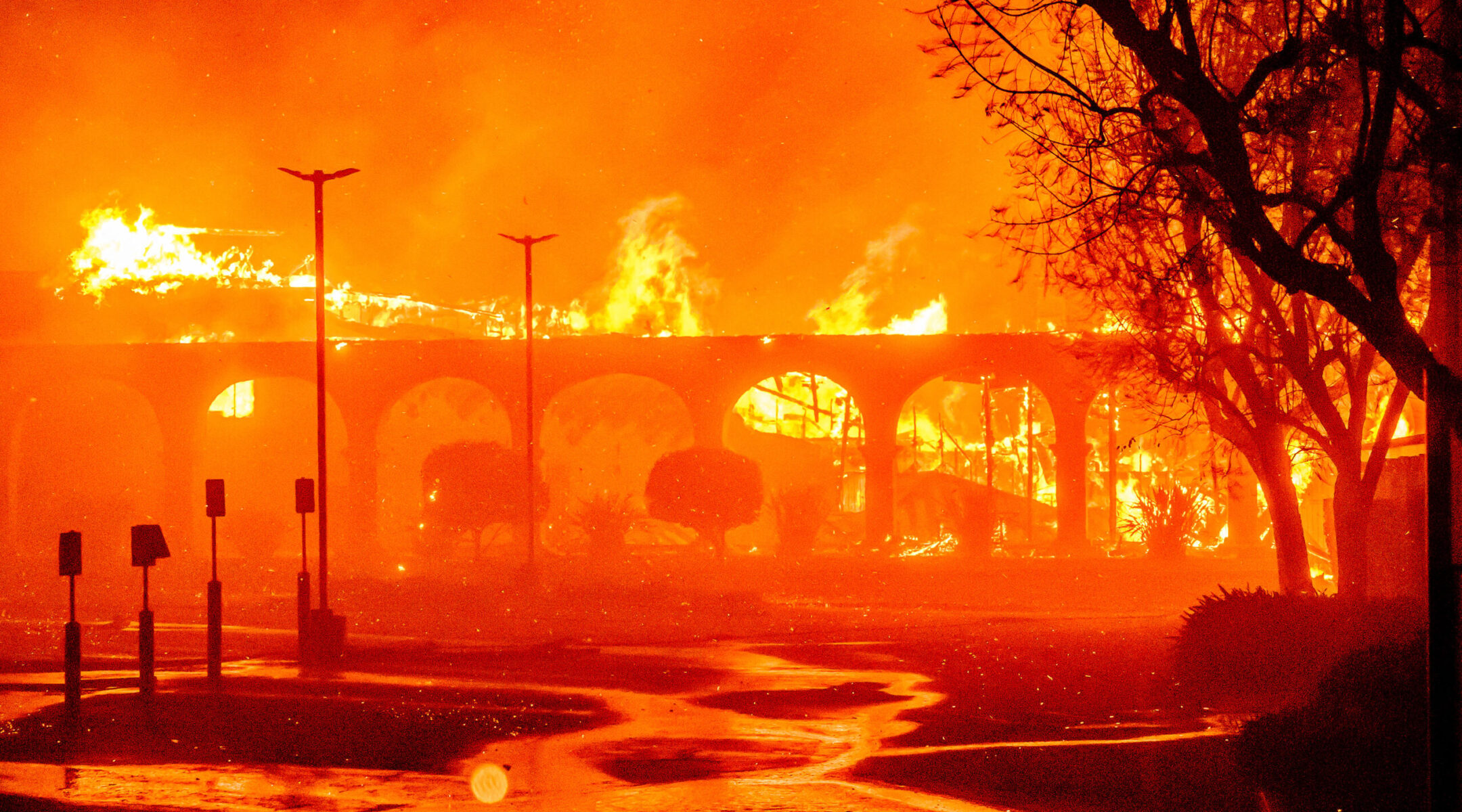 Pasadena synagogue burns down as fires rage across Southern California