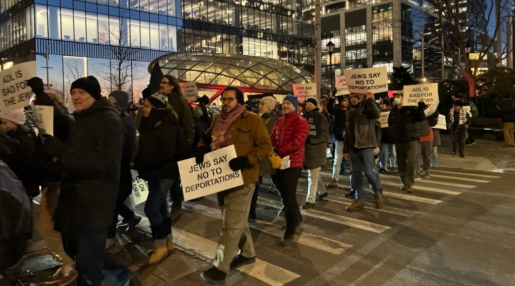 Protesters marching toward the Javits Center.