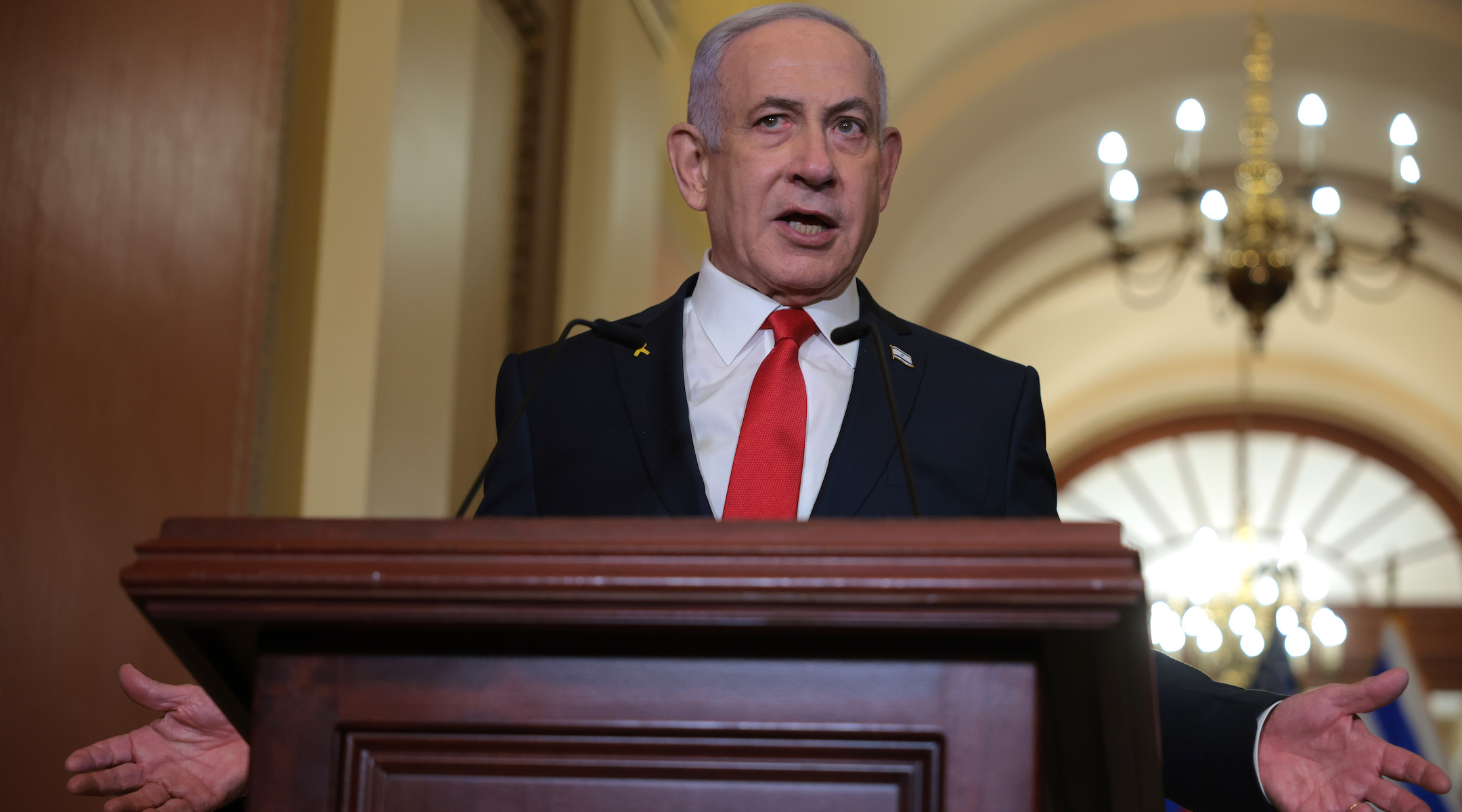 Israeli Prime Minister Benjamin Netanyahu delivers remarks following a meeting with U.S. Speaker of the House Mike Johnson (R-LA) at the U.S. Capitol on February 7, 2025 in Washington, DC. (Kayla Bartkowski/Getty Images)