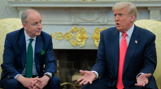 President Donald Trump and Irish Taoiseach Micheal Martin speak to journalists ahead of meetings in the Oval Office at the White House on March 12, 2025 in Washington, DC. (Chip Somodevilla/Getty Images)